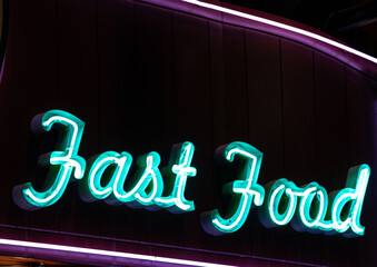 Bright neon fast food sign