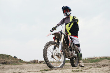Fototapeta na wymiar Motorcyclist enduro motocross training ground