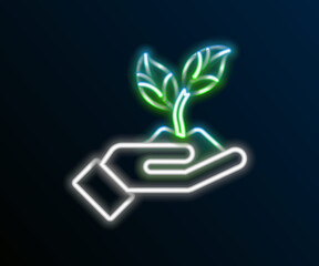 Glowing neon line Plant in hand of environmental protection icon isolated on black background. Seed and seedling. Planting sapling. Colorful outline concept. Vector