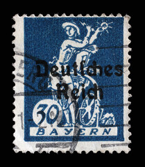 Stamp printed in printed in Bavaria with a "Deutsches Reich" overprint shows an allegory of electricity, harnessing light to a water wheel, circa 1920