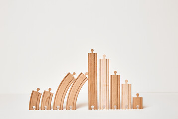 The large happy family concept: three children, parents, sister and brother, foster child. Wooden eco friendly toy railroad. Genus. A life. Copy space. Banner. Young social group. Parenthood. Nobody