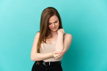 Teenager girl over isolated blue background with pain in elbow