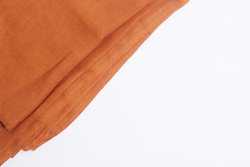 dark orange cloth with a combination of white background