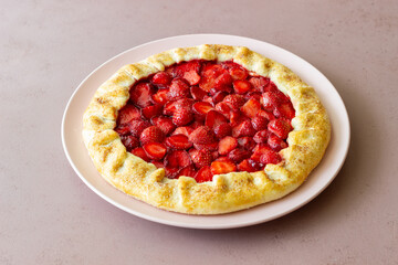Strawberry galette or open pie . Baking. Vegetarian food.