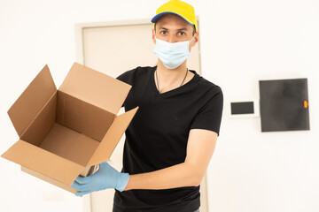 delivery man in protective gloves and a mask