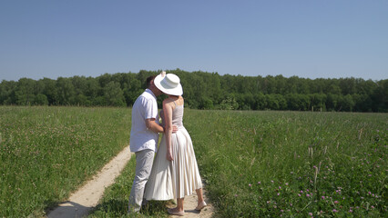 Lovers walk in the field
