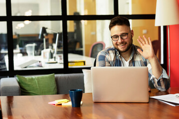 Businessman sitting looking at his laptop. Businessman working in the office on his laptop