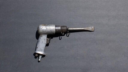 Fototapeta premium Air Chisel on a Black Background