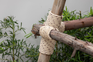 rope knot tied to a pole wooden.