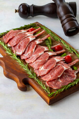 Lamb chops on wooden background