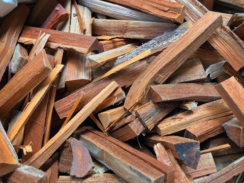 Organic Pathimukham or Sappan wood (Caesalpinia sappan) chips.  Dried wood has medicinal properties.