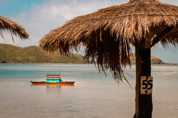fishing boat in japanese island on parasol