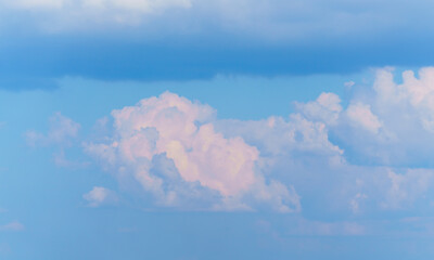 white clouds on a background of blue sky, cloud formations in the sky.