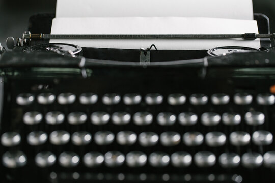 Vintage typewriter on wooden table