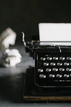Vintage typewriter on wooden table