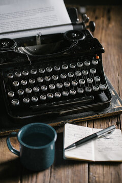 Vintage typewriter on wooden table