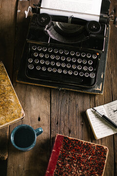 Vintage typewriter on wooden table