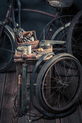 Fototapeta premium Small bicycle repair workshop with spare parts. Repair shop