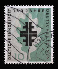 Stamp printed in Germany shows Turner Emblem and Oak Leaf, 150 years of German Turners and on the...