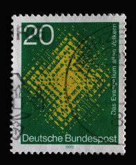 Stamp printed in Germany shows Cross Seen through Glass, for the world mission of Catholic missionaries, circa 1970