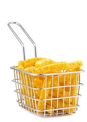 Spicy potato French fries in a metal frying basket on a white background