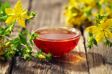 Red oil made from St. John's wort flowers