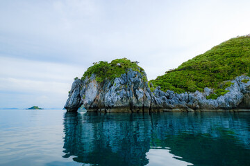Fototapeta na wymiar Rock island, stone, sea and blue sky 