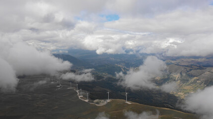 Aerial view of majestic turbines electric generators