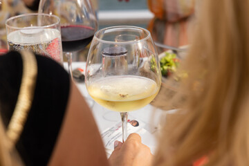 wine glass standing on the table at a celebration