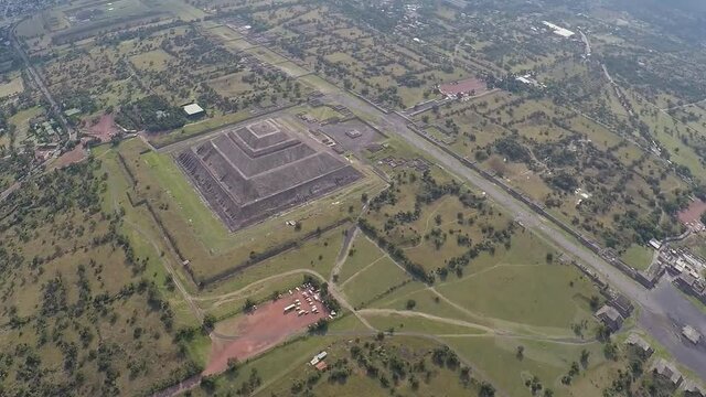 the world's third largest pyramid, the pyramid of the Sun in Teotihuacan with ruin walls in the foreground on a rare smog free day (aerial photography)