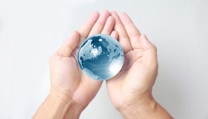 Glass globe in hand,Energy saving concept, by NASA