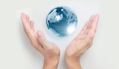 Glass globe in hand,Energy saving concept, by NASA