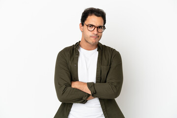 Caucasian handsome man over isolated white background with unhappy expression