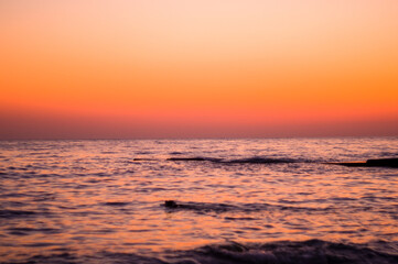 Amazing sea sunset, the sun, waves, clouds