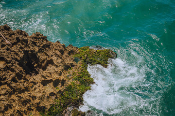 waves crashing on rocks