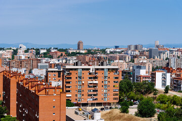 Skyline of Madrid from Tio Pio Park. Aerial cityscape of Vallecas neighbourhood a sunny day