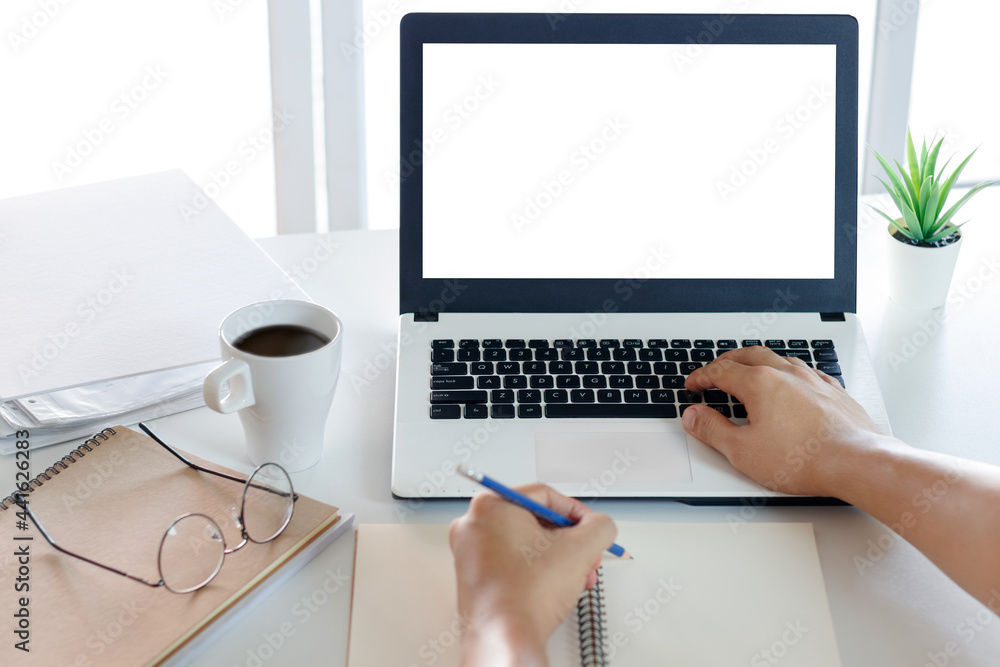 Poster mockup copy space computer notebook laptop concept , a man's hand using a laptop on internet website