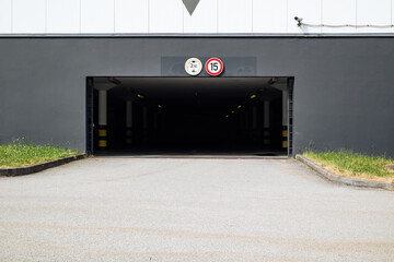 Empty entrance to the underground car park with street on foreground