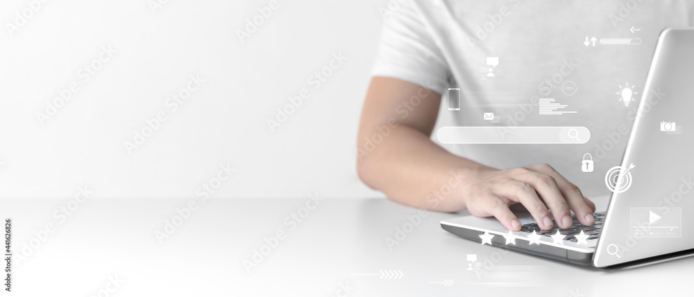 Poster businessman are working on the laptop keyboard to use the search engine optimization tool. to find c