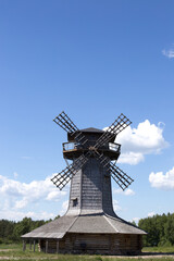 Large windmill against a bright blue sky