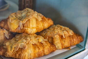 Almond white chocolate top on croissant with close up shot from baking.