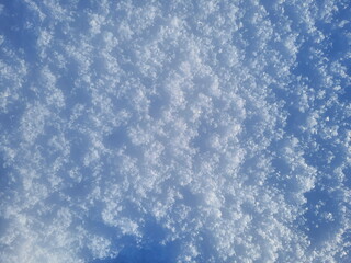 Obraz premium Abstraction of frozen blue snow, snow background close-up.