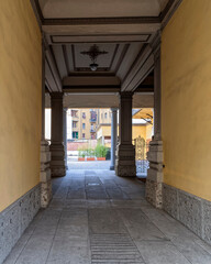 Italy Milan, vintage residential house entrance gate to internal yard