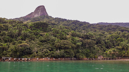 Sugarloaf Peek, or Pico do Pao de Acucar in Saco do Mamangua, a tropical fiord in Paraty, Rio de...