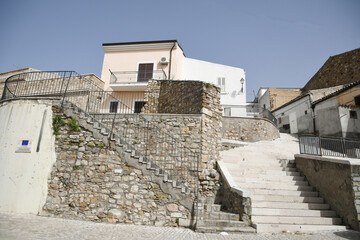 A narrow street in Candela, an old town in the Puglia region of Italy.