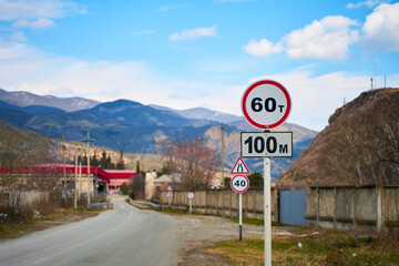 Car road sign on a mountain road