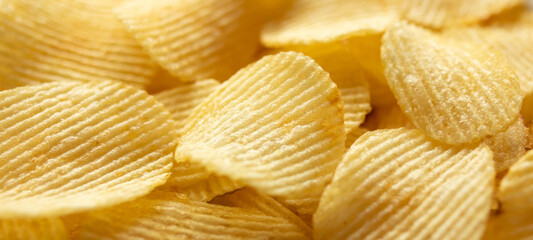 crispy golden potato chips snack texture background