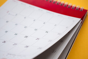 calendar page on yellow background business planning appointment meeting concept