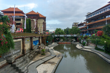 Kumbasari Market, Bali, Indonesia April 2, 2021: One of the icons of Denpasar city. The river `Tukad Badung` is between two traditional markets in Denpasar, namely Badung Market and Kumbasari Market