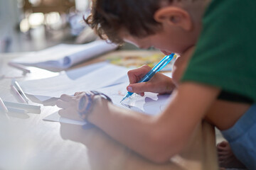 Close up boy drawing